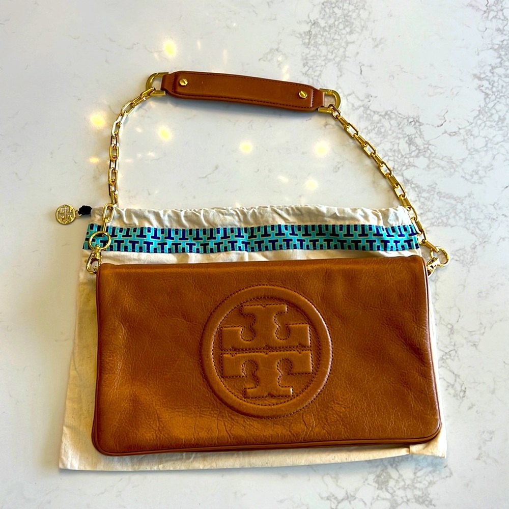Authentic Tory Burch envelope shoulder or clutch bag with gold chain. New